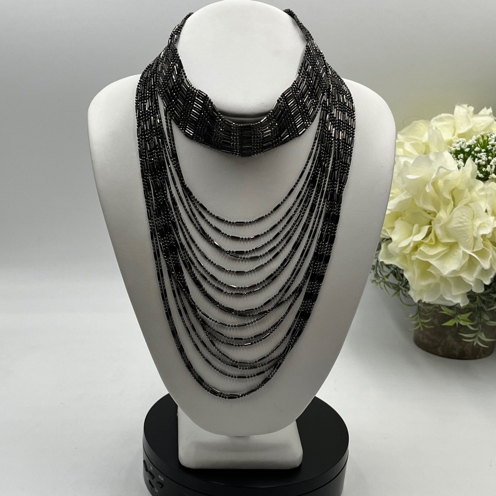 Natasha Couture Black Multi Chain
Choker and Bib Layered Statement
Necklace